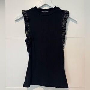 Ruffled top with faux leather trim